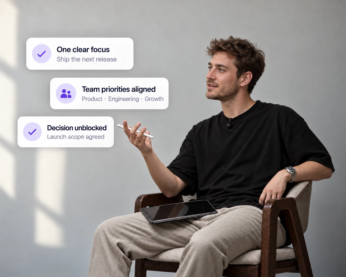 A founder talking in a chair, with Decided cards showing one clear focus, team priorities aligned and a decision unblocked